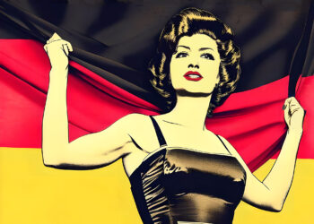 Eine Frau hält eine große Deutschlandflagge